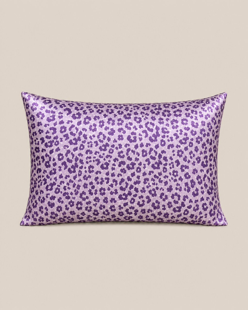 Purple Leopard 22 momme silk front pillowcase on a warm beige studio background.