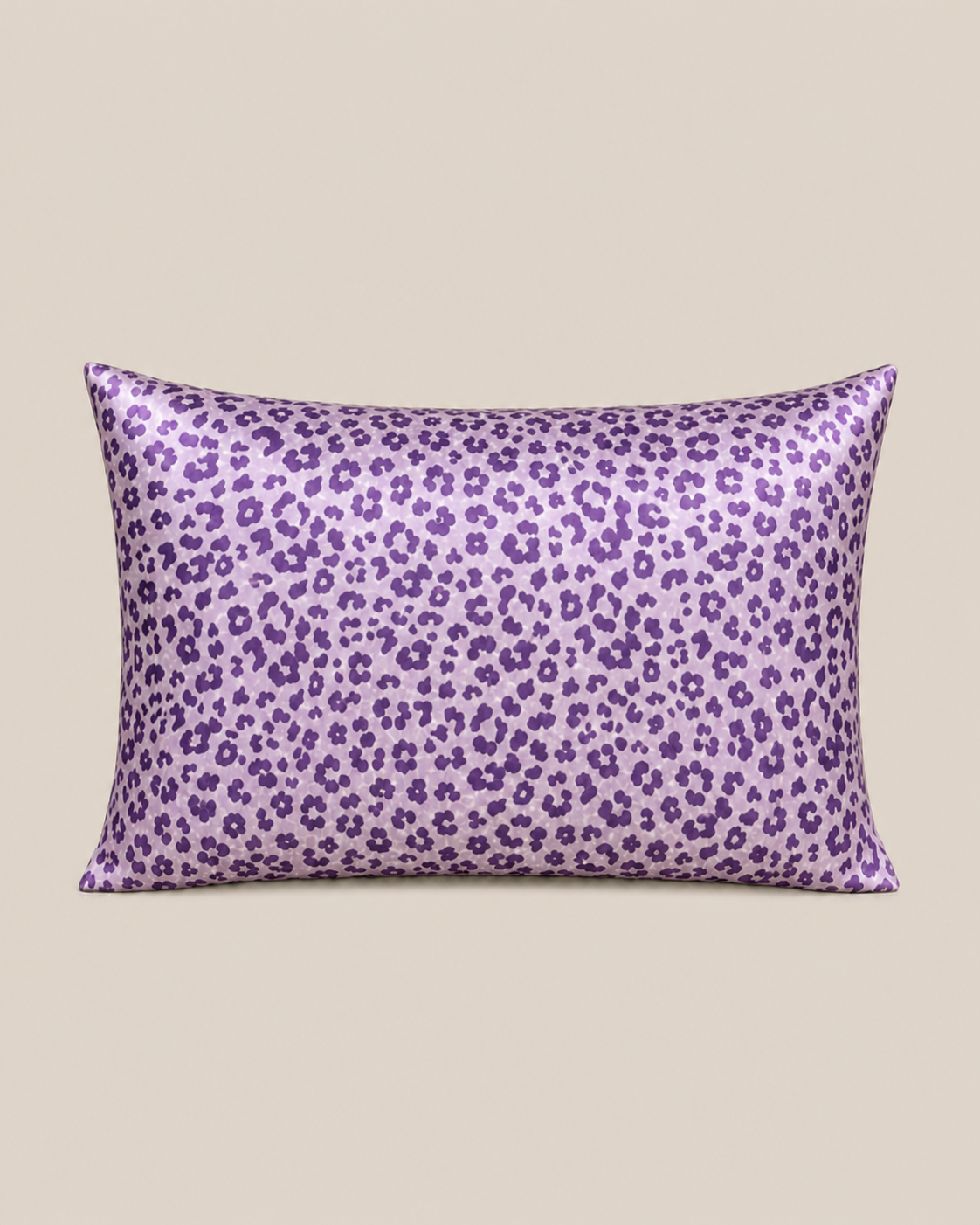 Purple Leopard 22 momme silk front pillowcase on a warm beige studio background.