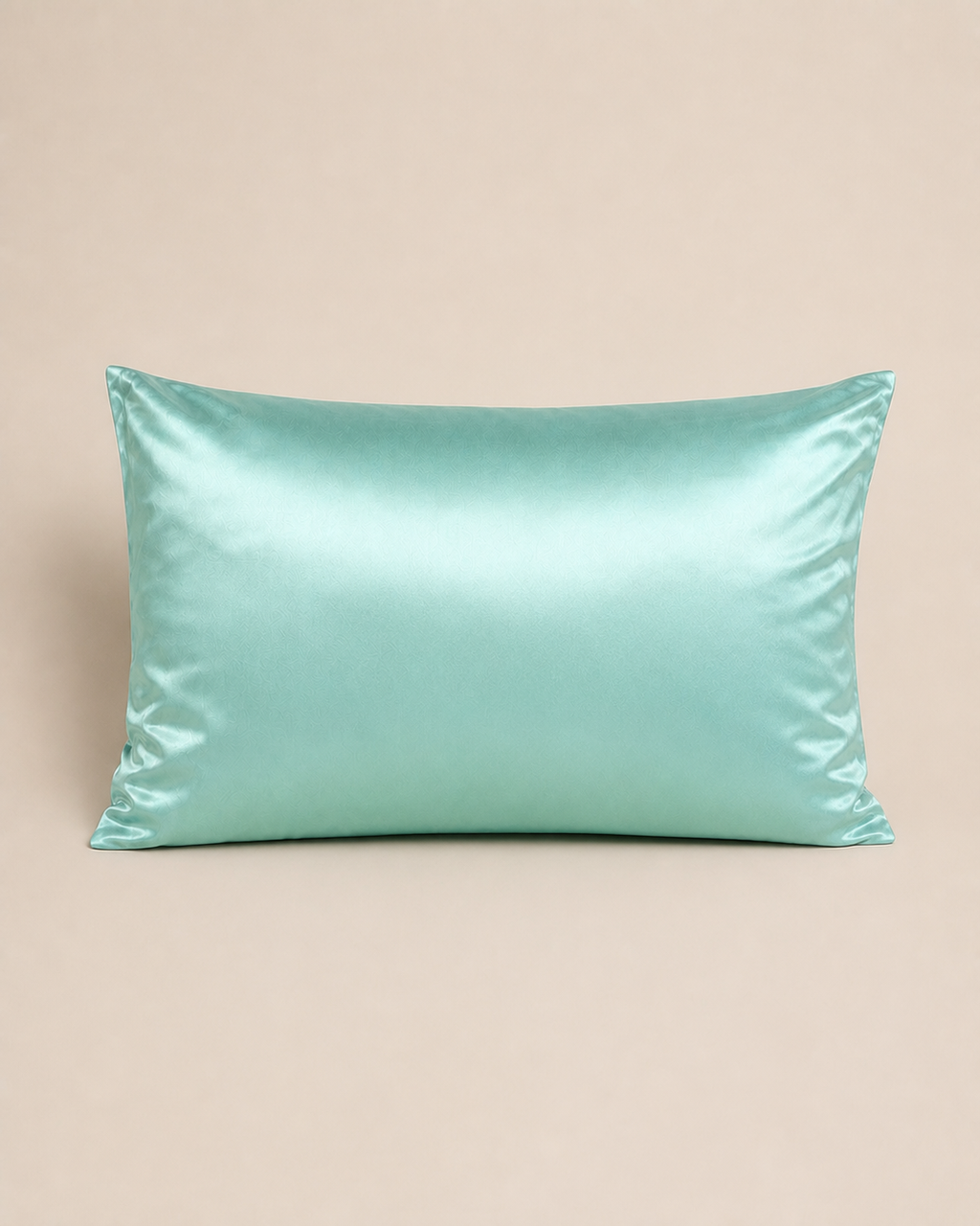 Tiffany Blue 22 momme silk front pillowcase on a warm beige studio background.