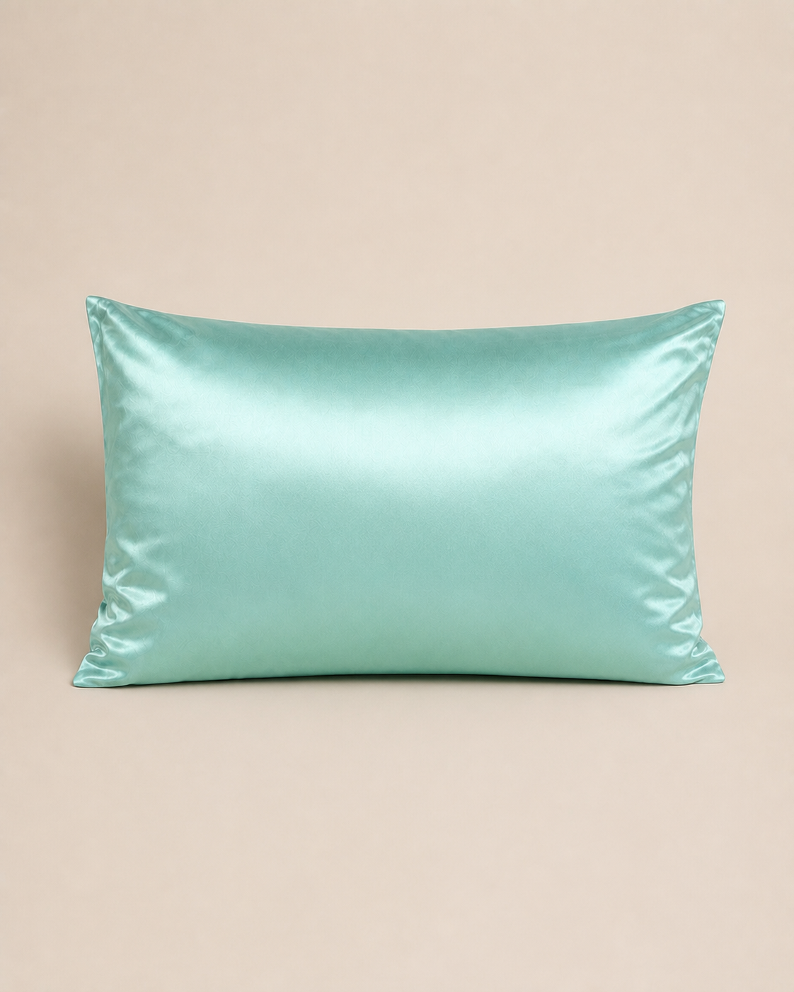 Tiffany Blue 22 momme silk front pillowcase on a warm beige studio background.