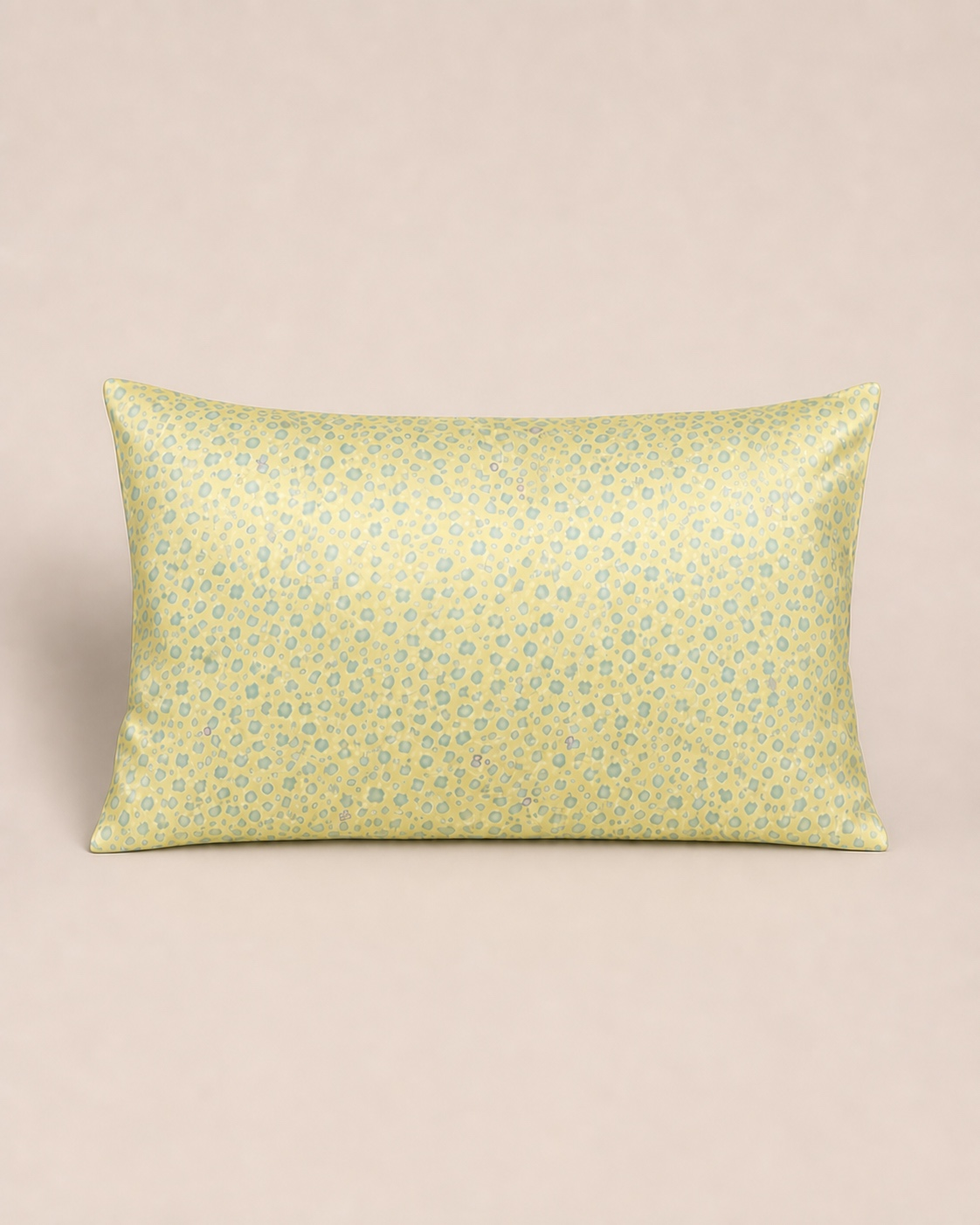 Yellow Leopard 22 momme silk front pillowcase on a warm beige studio background.