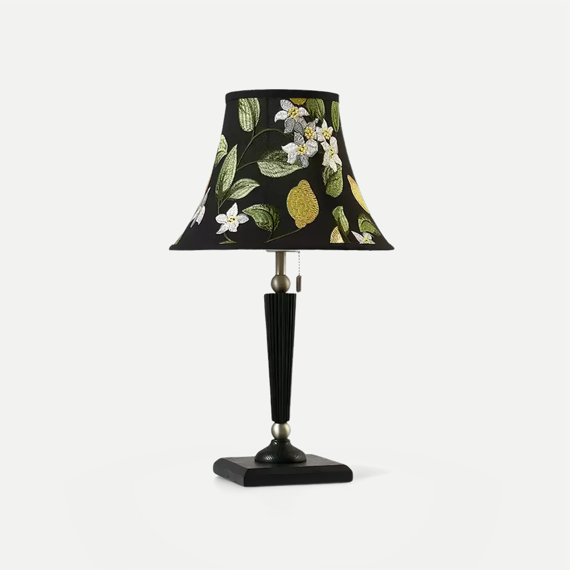 French style MCM table lamp with a decorative lampshade featuring floral and lemon designs on a white background