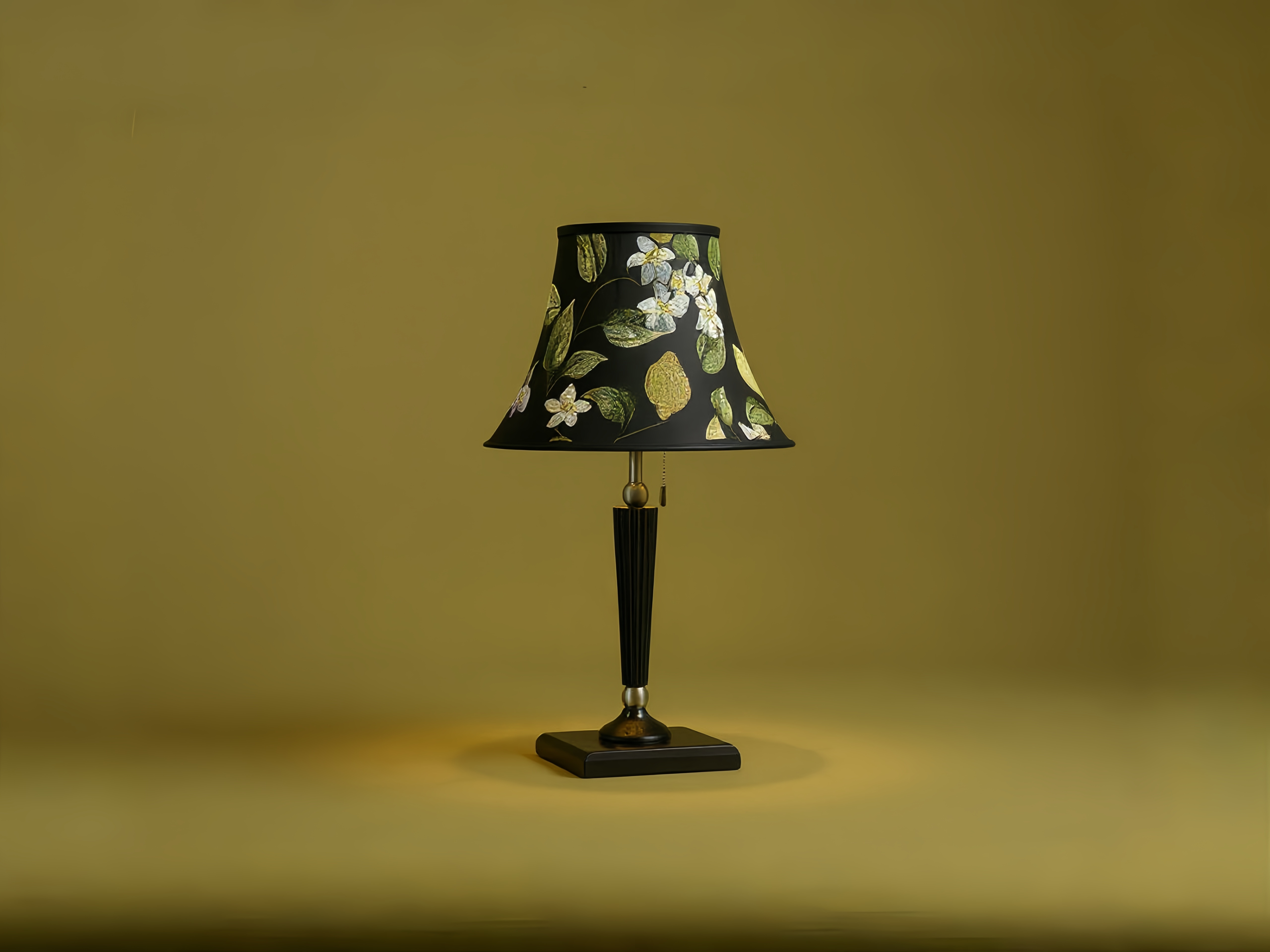 Mid-century modern table lamp with floral fabric shade, set against a soft yellow backdrop