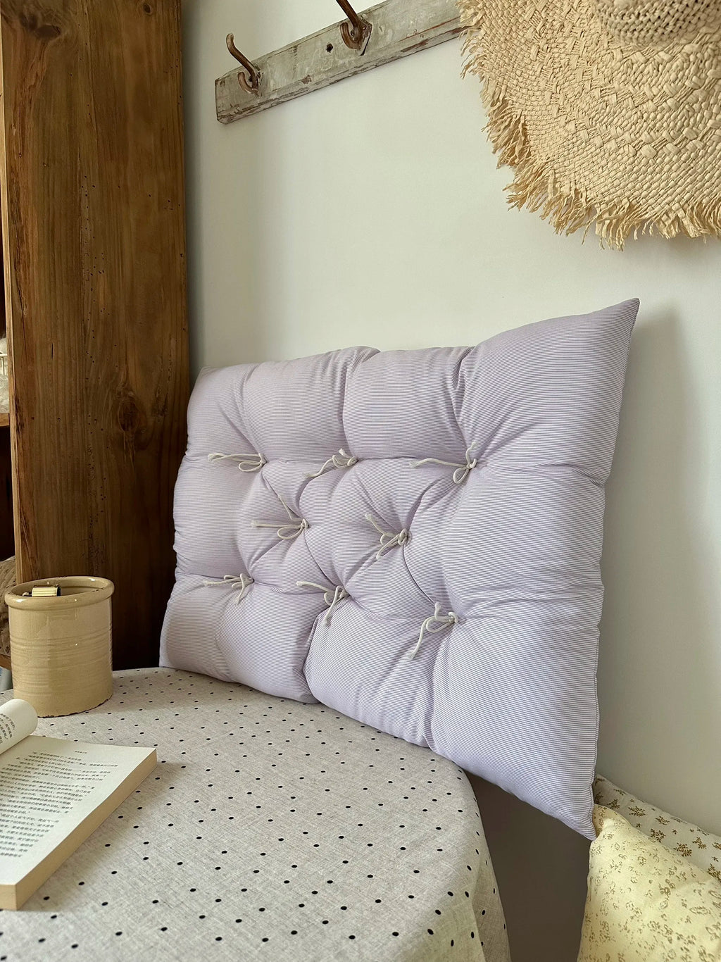 Pale Lavender Stripe French vintage patterned pillow cushion styled in a calm bedroom corner.
