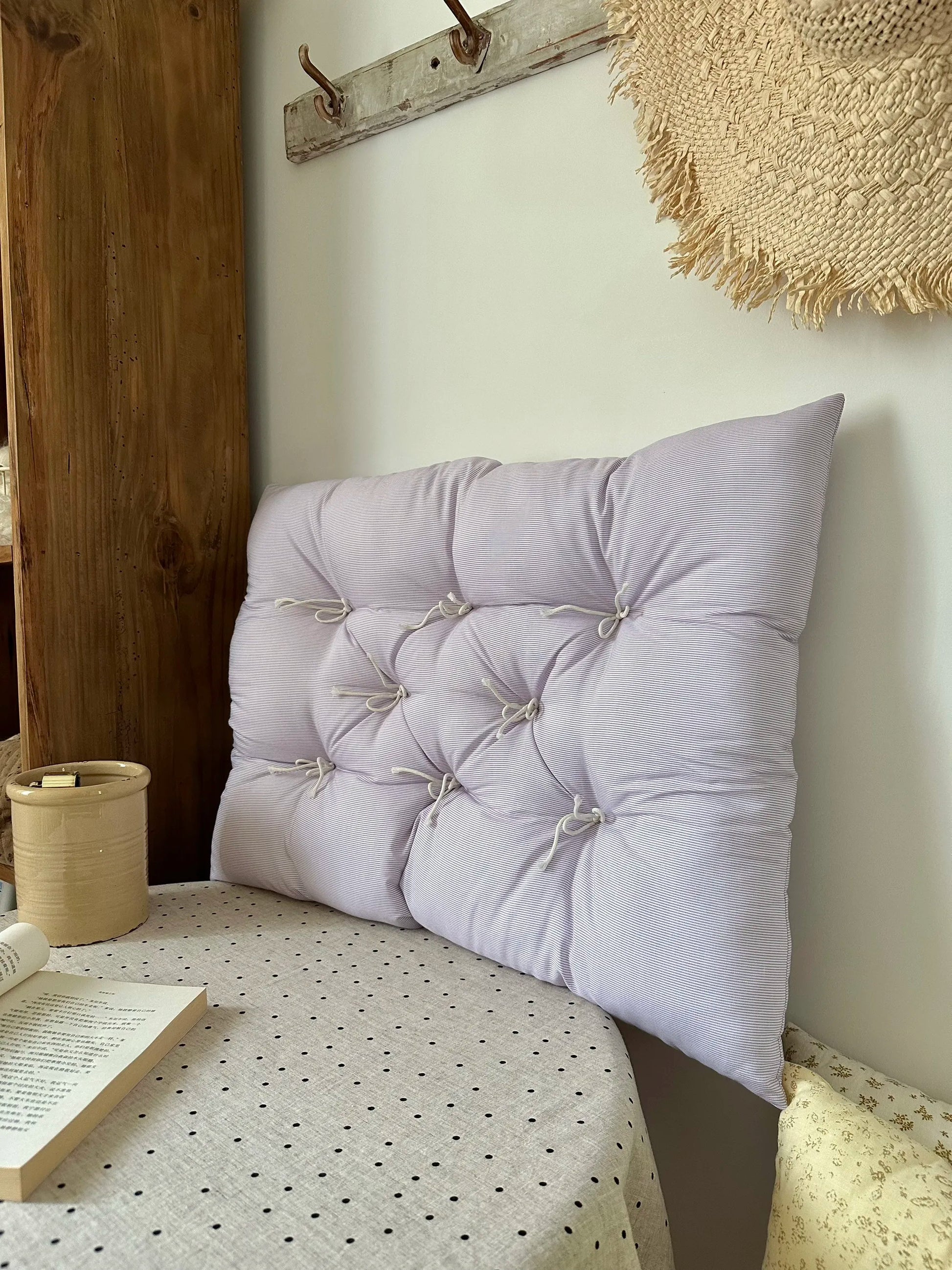 Pale Lavender Stripe French vintage patterned pillow cushion styled in a calm bedroom corner.