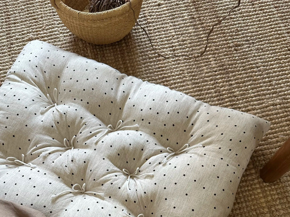 Close-up detail of the Polka Dot French vintage patterned pillow cushion with soft tie details.