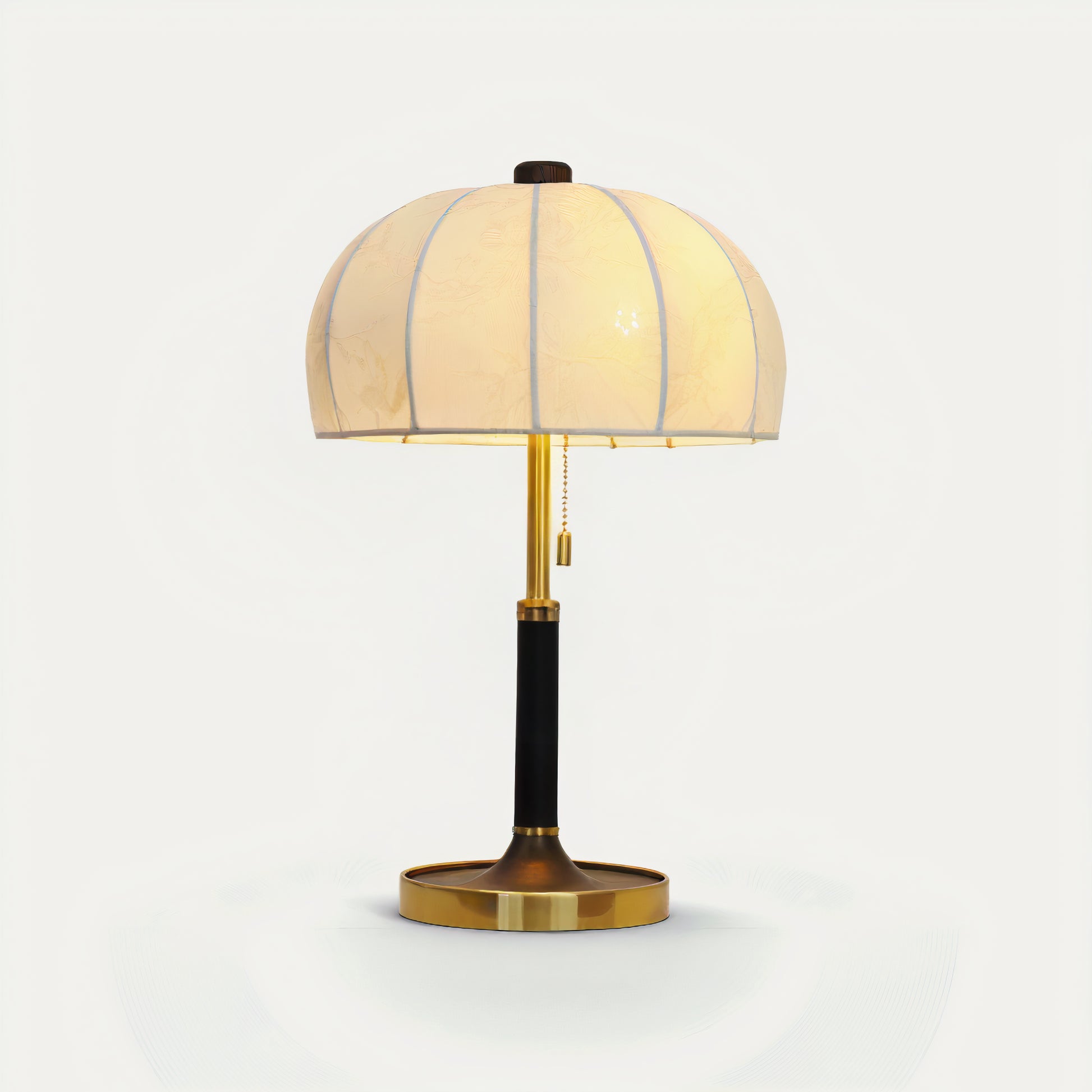 French vintage table lamp with a beige shade on a white background