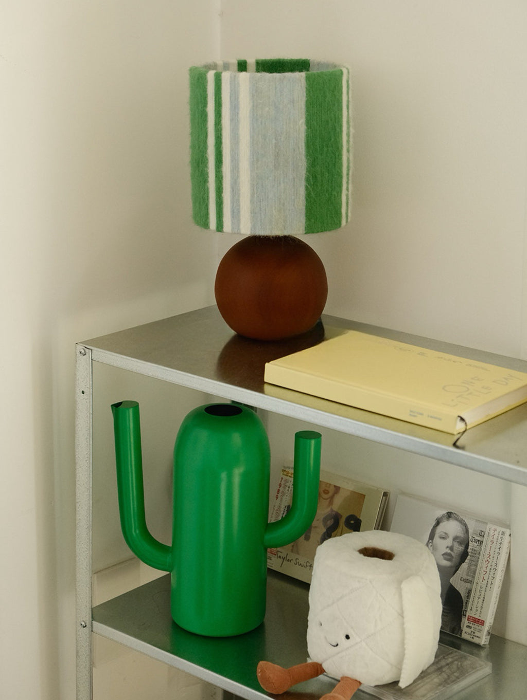 Sage & Forest Mohair & Oak Wood Table Lamp - Verdino styled on a metal shelf with green cactus watering can and curated decor items
