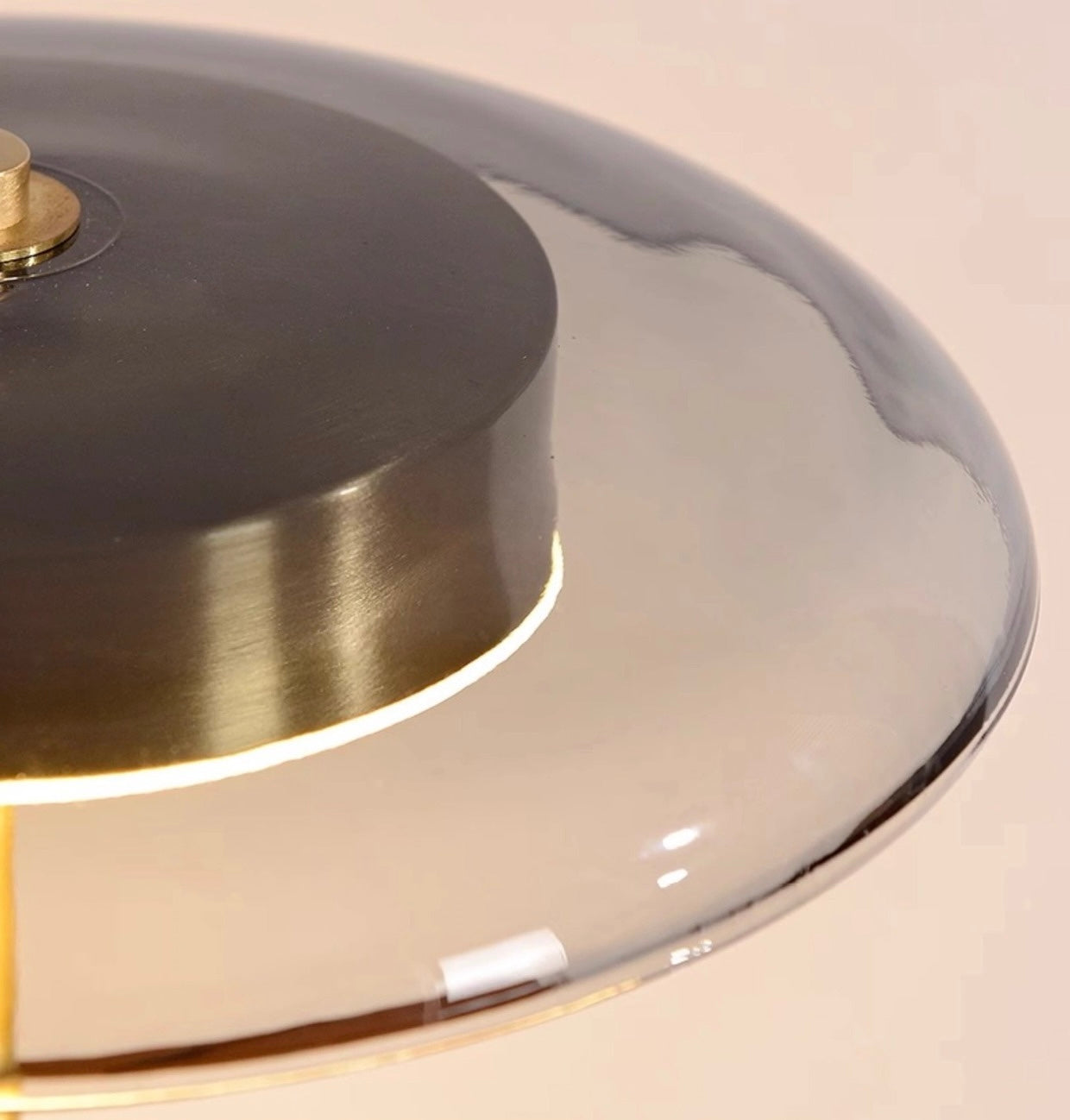 American Mid-Century Modern Table Lamp close-up of the smoked glass mushroom dome shade with brass trim ring detail