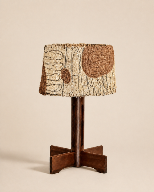 Petal blush loofah and solid wood table lamp on a warm beige background
