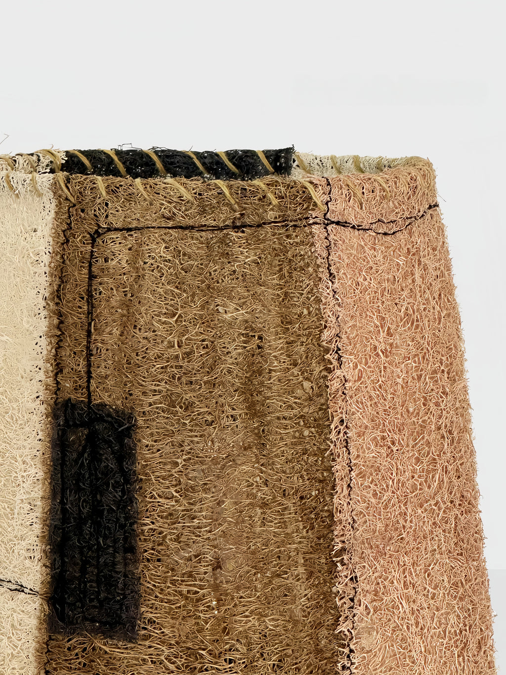 Wabi-Sabi Loofah Patchwork Table Lamp - Contrast close-up highlighting the handcrafted stitching